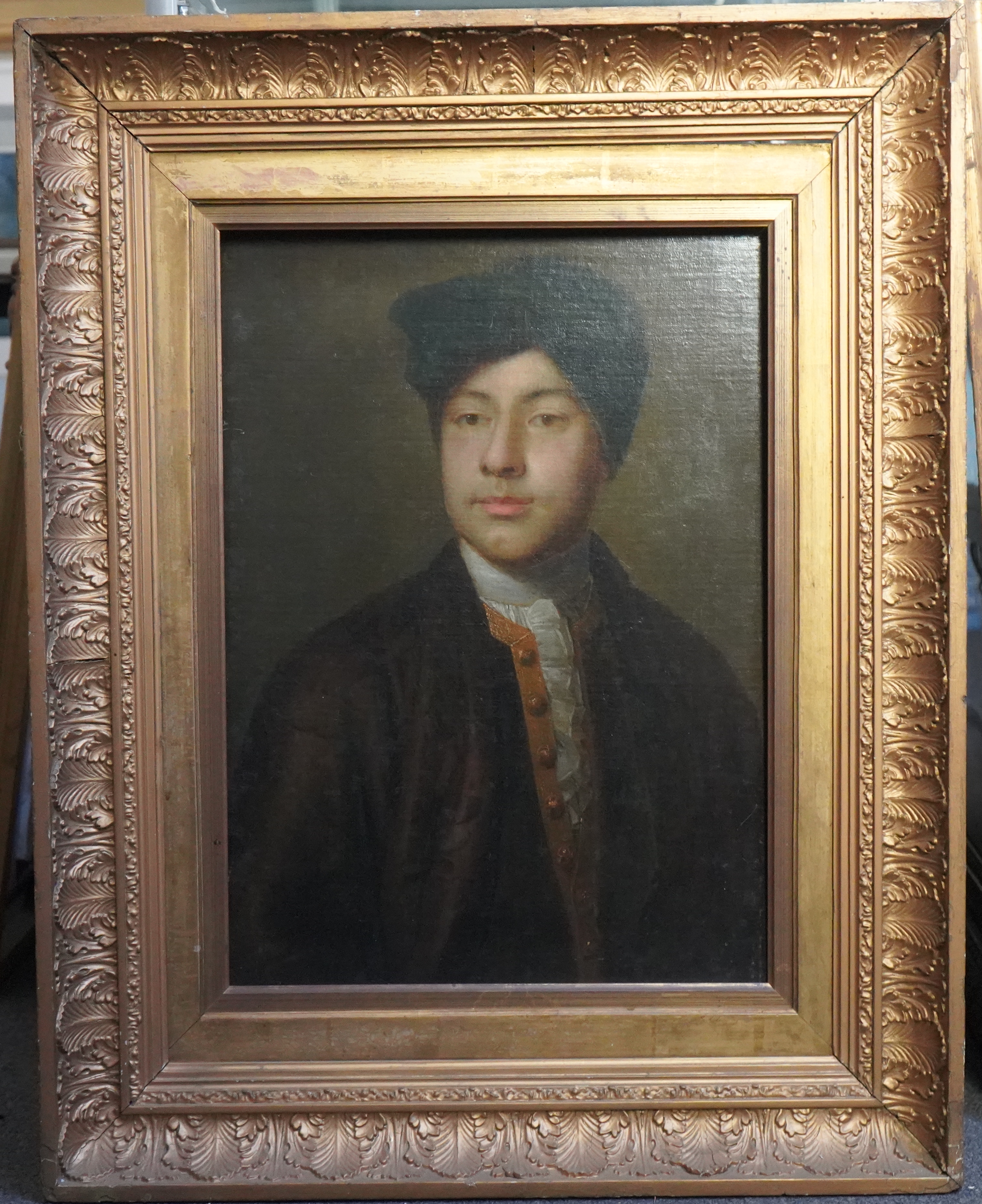 18th century English School , Half length portrait of a gentleman wearing a green turban, oil on canvas, 57 x 40cm